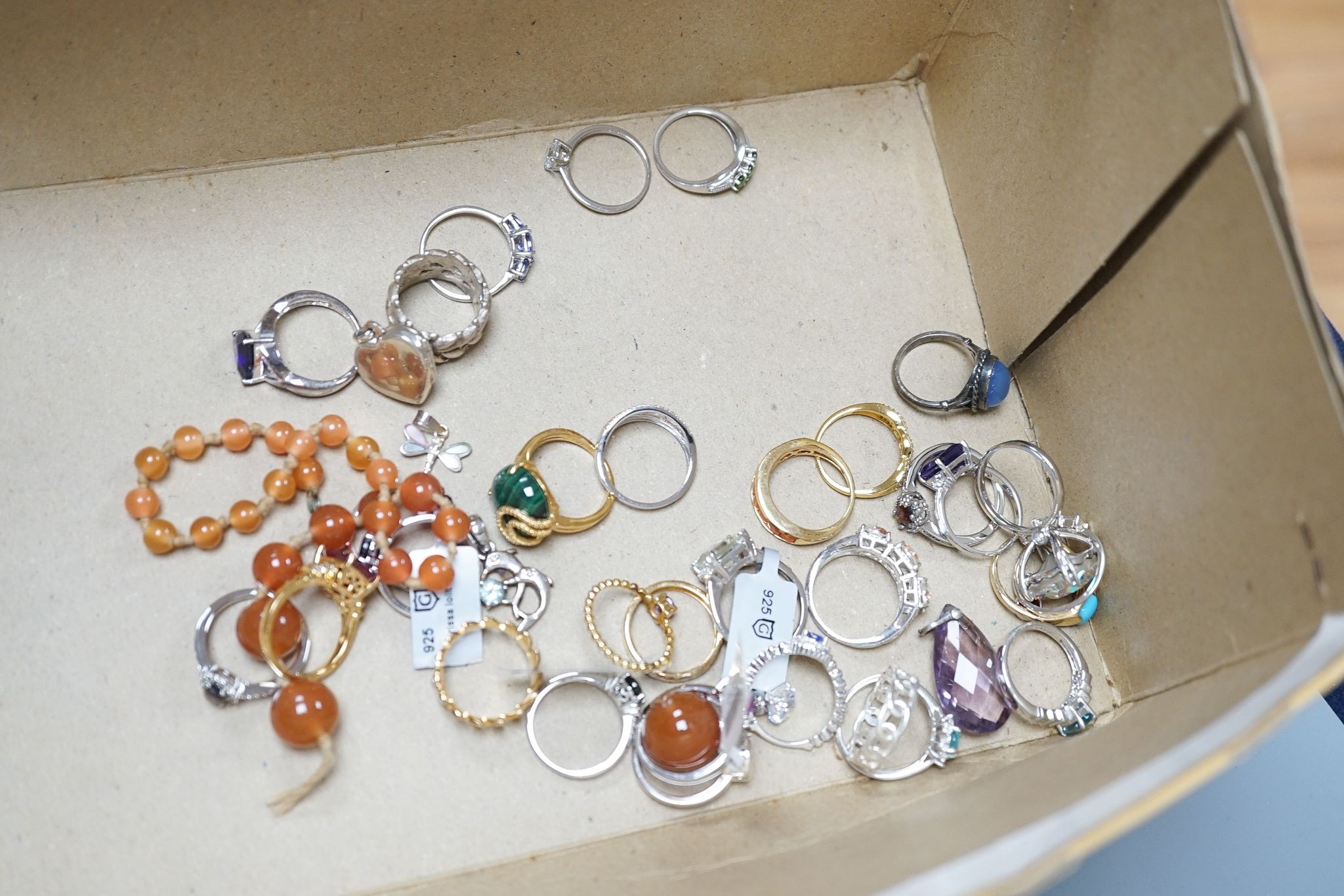 A silver and enamel mounted glass scent bottle(a.f.), three silver mounted glass toilet jars and aassorted jewellery including silver.